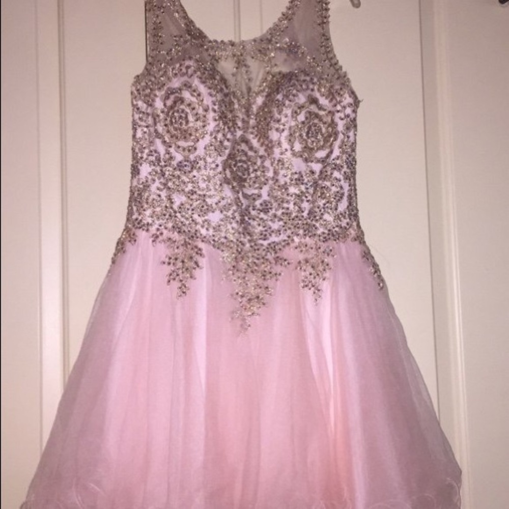 Pink dress with gold accessory